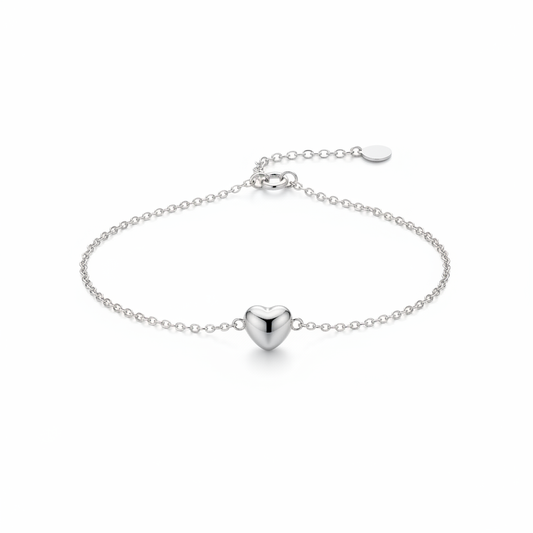 Delicate silver chain bracelet with heart charm